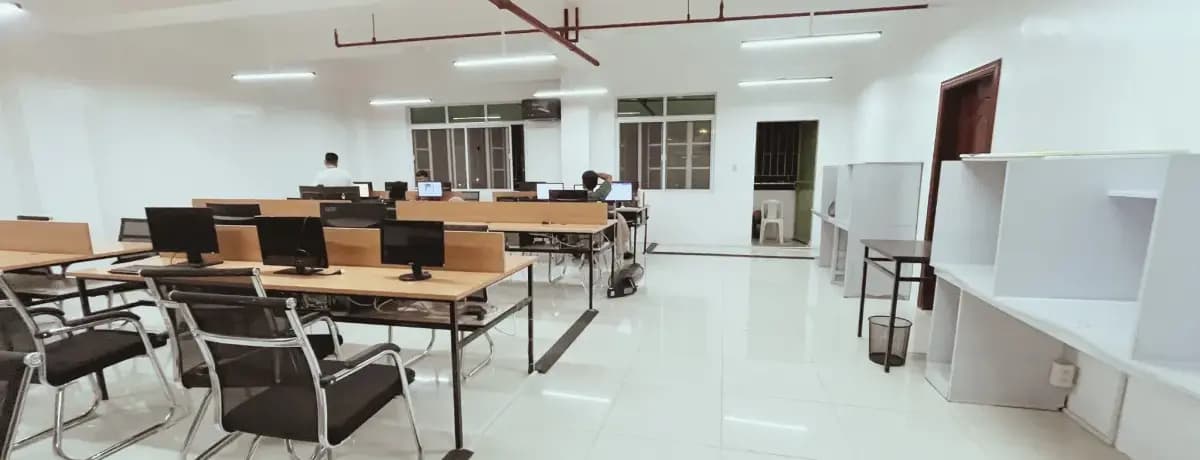 The Relaytask production floor in Naga City, with rows of dedicated workstations and team members at work